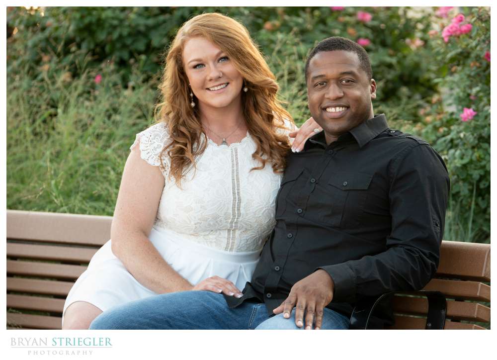 engagement photo on bench